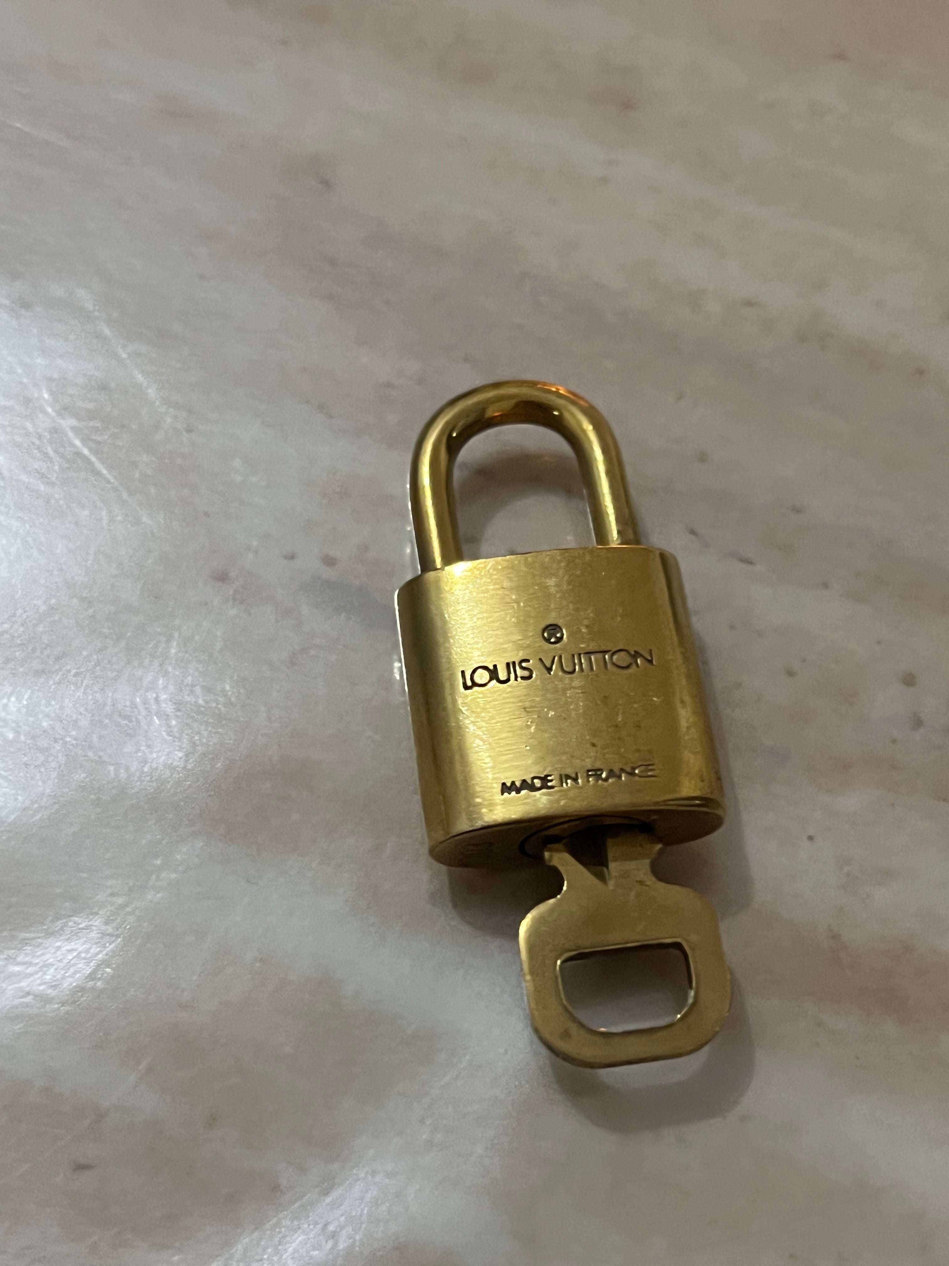 LOUIS VUITTON Padlock Gold Tone