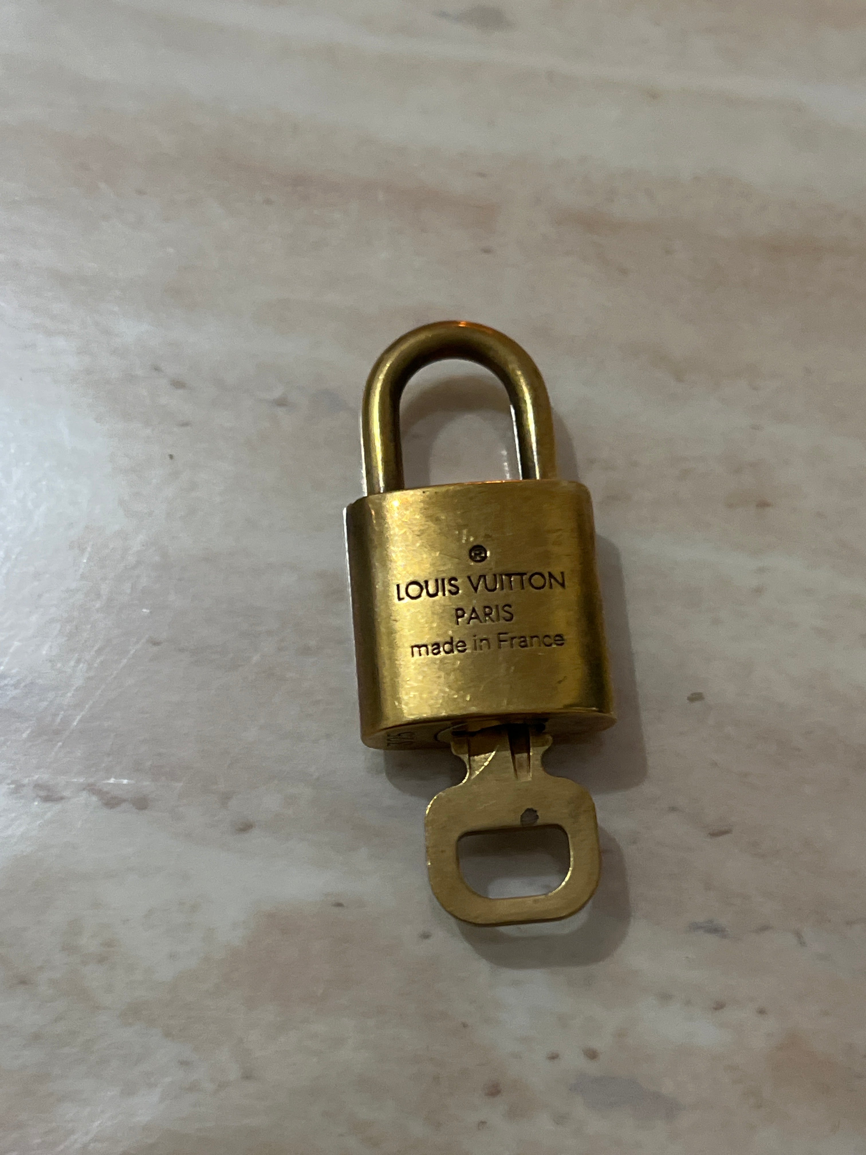 LOUIS VUITTON Padlock Gold Tone