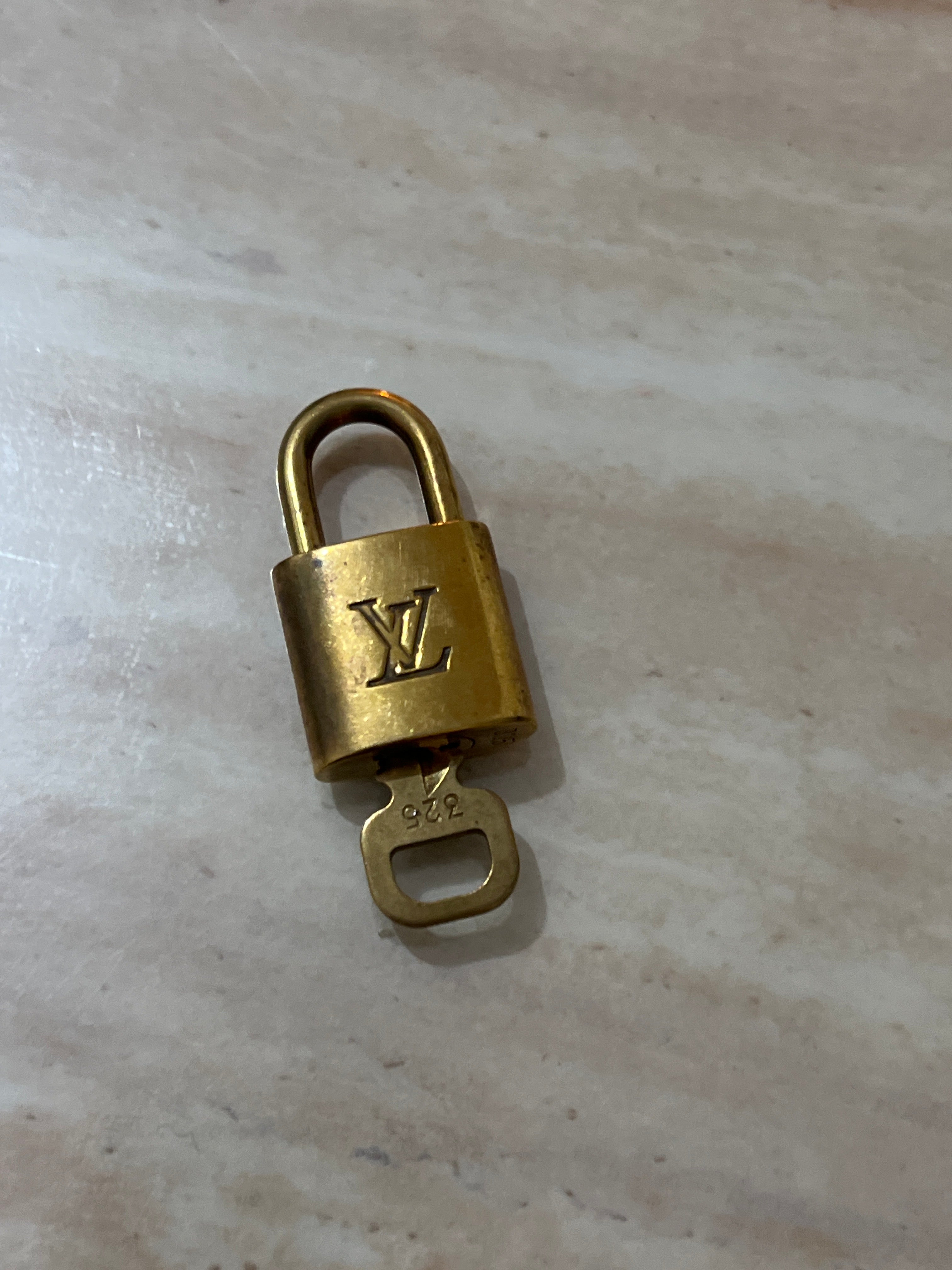 LOUIS VUITTON Padlock Gold Tone