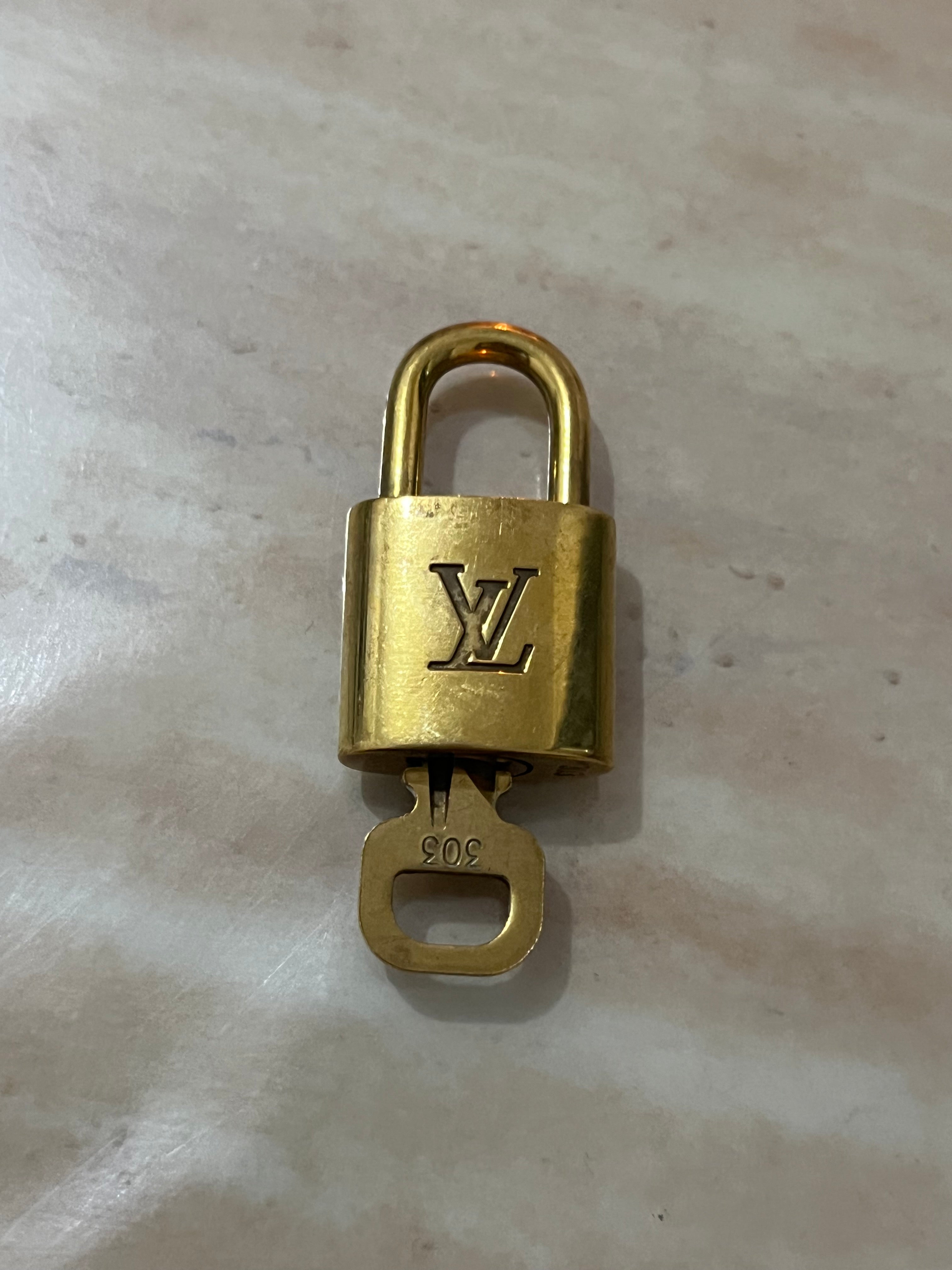 LOUIS VUITTON Padlock Gold Tone