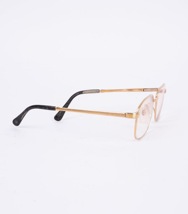 Golden glasses - Volver