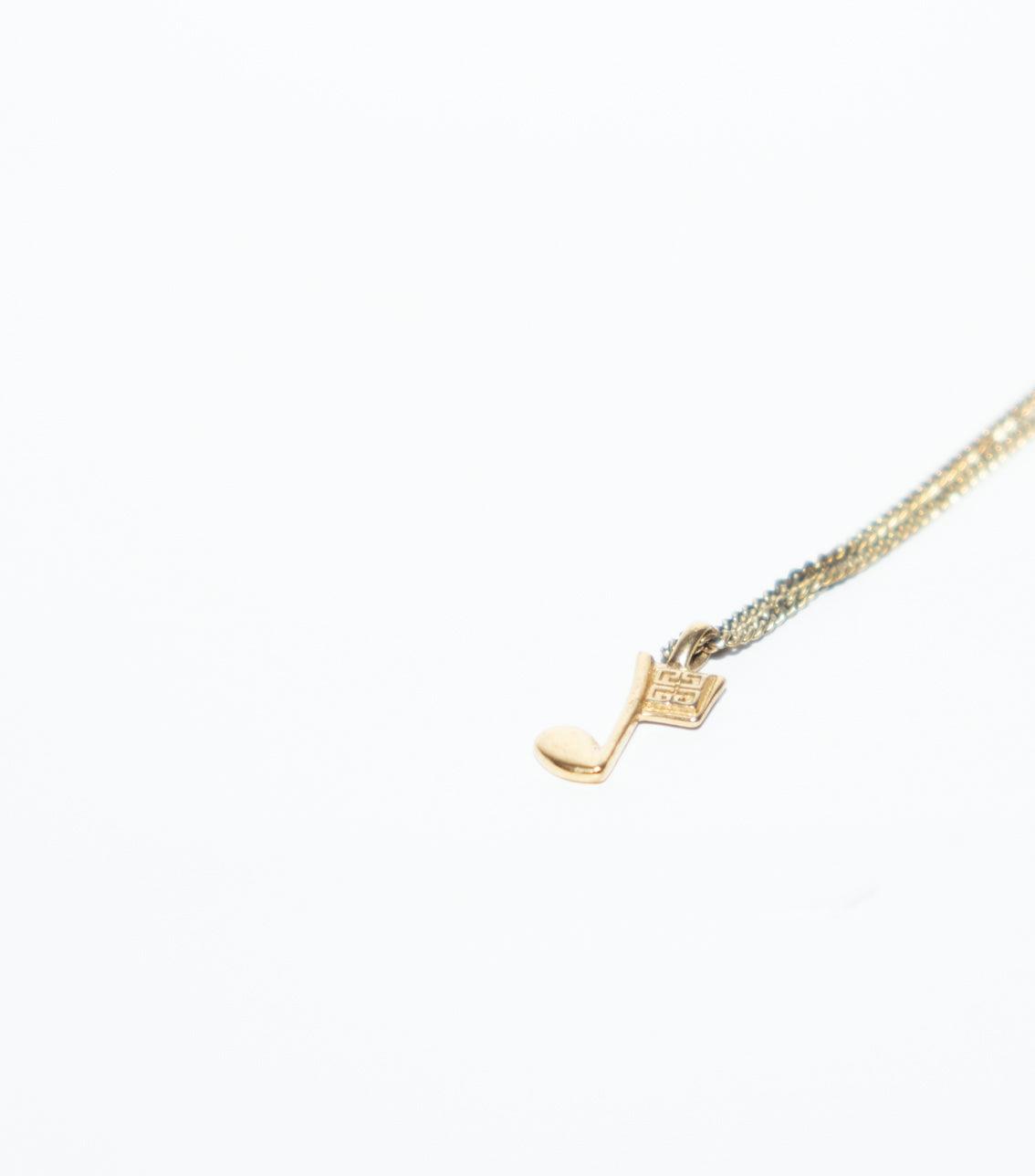 Golden Musical Note Necklaces - Volver