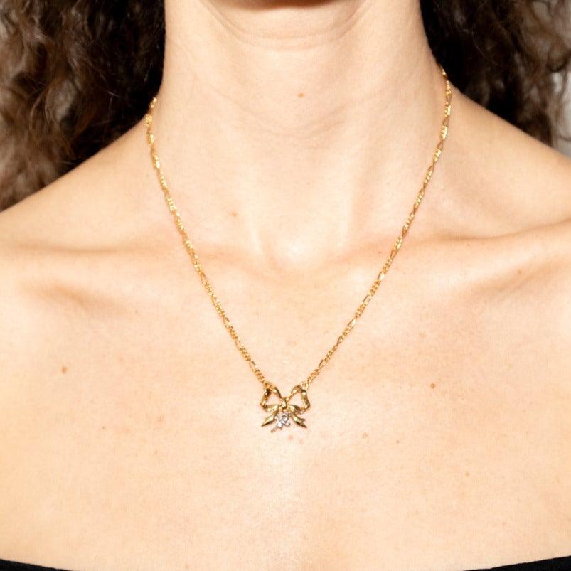 Papillion Golden Necklaces - Volver