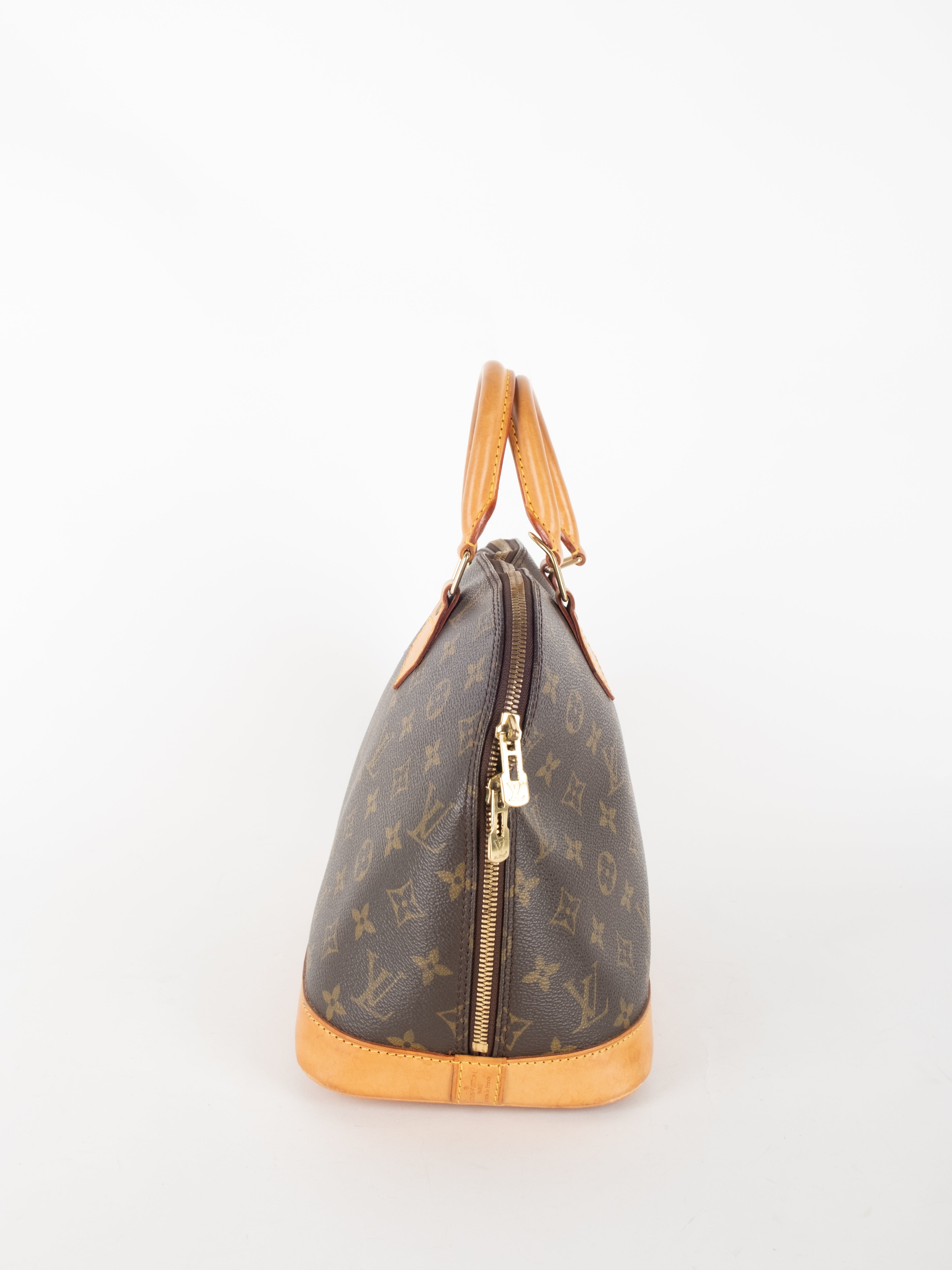 Louis Vuitton Alma Monogram Bag