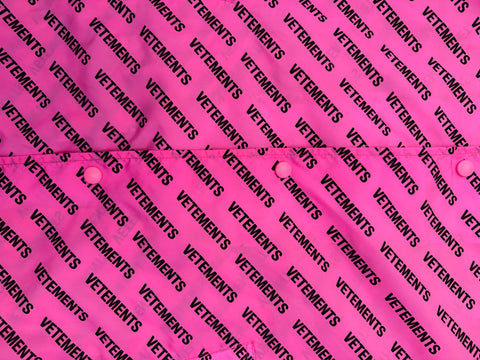 VETEMENTS Raincoat Pink Logo Print